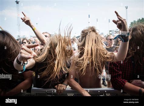 Headbanging Music And Heavy Metal Fans Attend A Live Concert At The