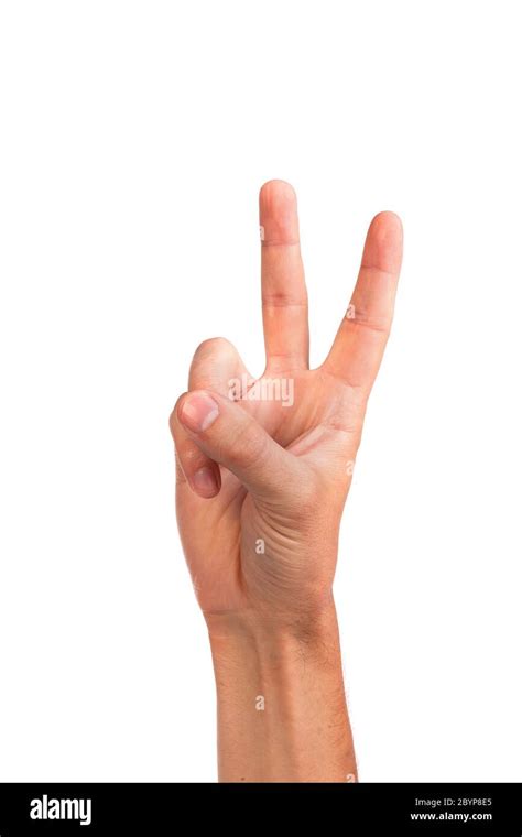 Hand With Two Fingers Up In The Peace Or Victory Symbol Stock Photo Alamy
