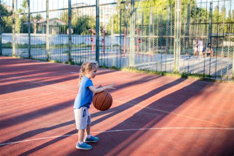 Girl Dribbling A Basketball Stock Photos Pictures And Royalty Free