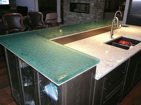 I built this bar in mt basement and decided on doing the cracked glass top. The Uses & Benefits of Raised Glass Countertops - CBD Glass