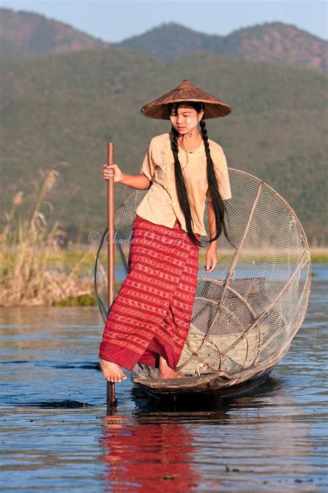 Myanmar Burma Young Burmese Woman Rowing With One Leg Looking For A