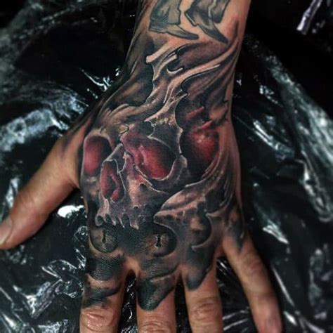 The hand tattoo sketches were filled with a special symbolism for centuries, they could tell a lot about a person, his nature and mans personality. 80 Skull Hand Tattoo Designs For Men - Manly Ink Ideas