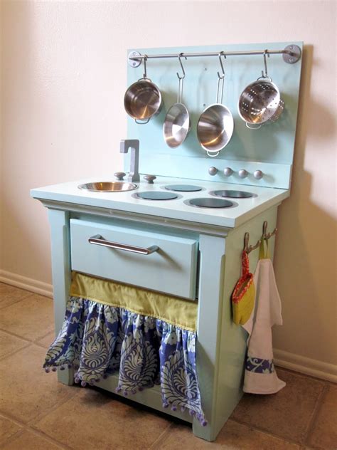 Play kitchens are some of the best investment parents can make for their kids. the hawkins family: Play Kitchen