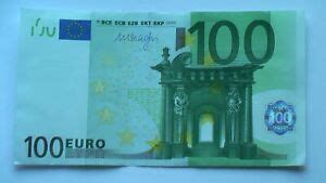 Und was sind die sicherheitsmerkmale der ersten serie? 100 Euro Schein 1. alte Ausführung mit Signatur "Draghi ...