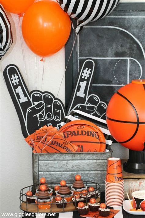 A Basketball Themed Birthday Party With Orange And Black Decorations