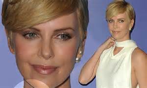 Charlize Theron Attempts To Hide An Incision Mark On Her Neck After It