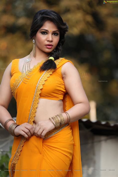check out high definition photos of hyderabad model upcoming actress zaara khan in yellow saree