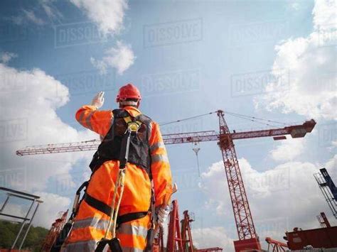 Crane Worker Directing Cranes Stock Photo Dissolve