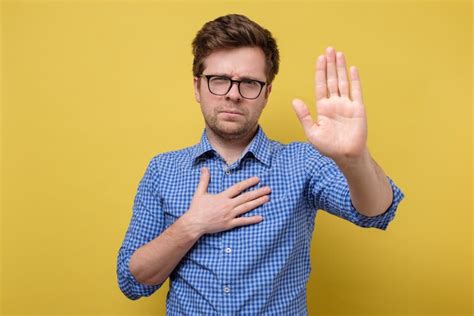 Man Makes Swearing Sign With His Hand Open And Up Stock Photo Image