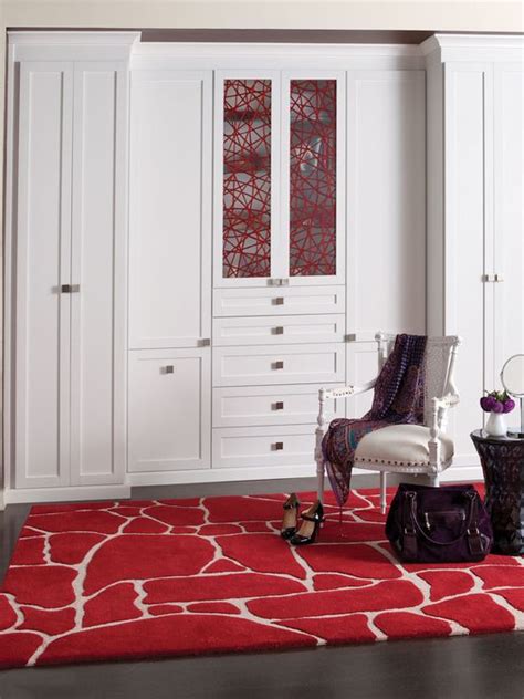Do you think master closet built ins seems to be nice? California Closets DFW wardrobe with red ecoresin panels ...