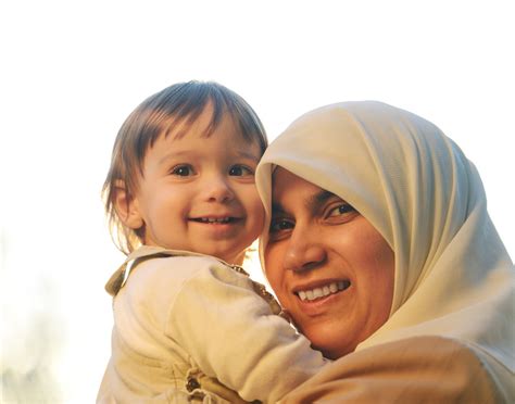 Middle Eastern Muslim Mother Playing With Her Li Royalty Free Image