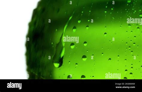Drop Of Condensate Drips On Beer Bottle Glass Full Hd Close Up Slow