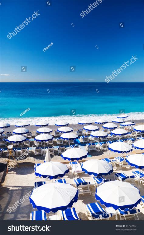 French Beach With Umbrellas Nice France Stock Photo