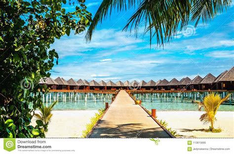 Over Water Bungalows On A Tropical Island Maldives Stock