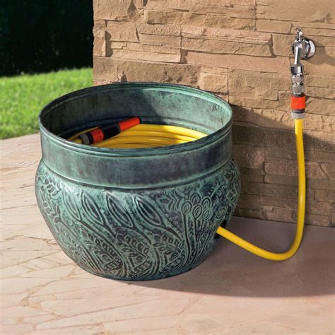 Hose reel comes with a leader hose and features a manual crank. gardener tools #GardeningTips (With images) | Diy garden decor, Garden hose holder, Modern garden