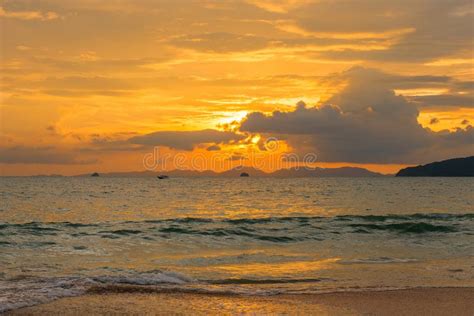 Bright Orange Sunset With Beautiful Clouds Over The Sea Of Thailand