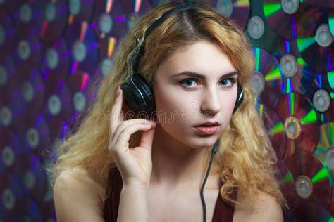 Beautiful Woman In Headphones Have Fun And Listen Music Stock Image