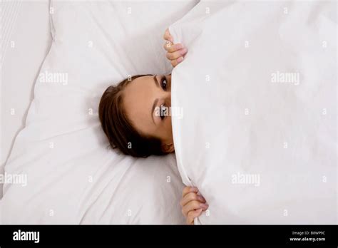 Hiding Under Bed Covers Hi Res Stock Photography And Images Alamy