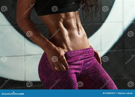 Fitness Sexy Woman Showing Abs And Flat Belly Beautiful Muscular Girl Shaped Abdominal Slim