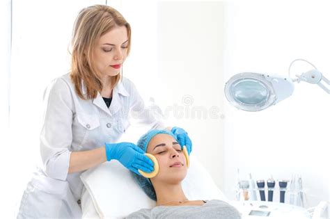 Beautician Makes Client Facial Massage Sponges Moisturizing Cleaning