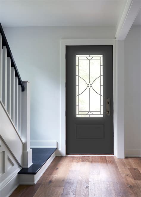 Black Front Door With Decorative Glass Illuminates Entryway Pella