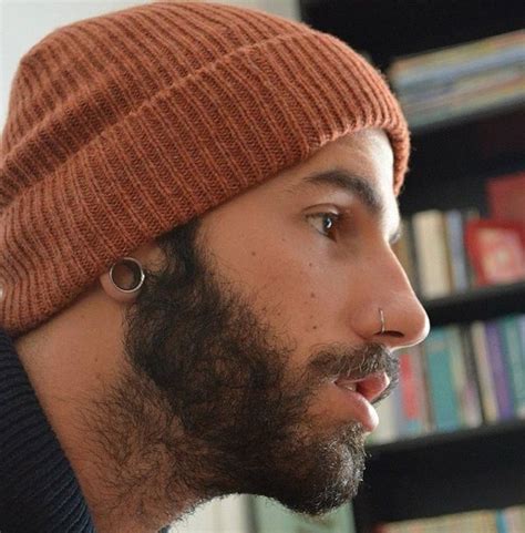 Stretched Earlobe And A Nostril Ring Piercing Nariz Hombre Piercing