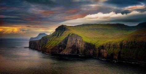 Landscape With Coastal Cliffs At Sunset Eysturoy Faroe Islands