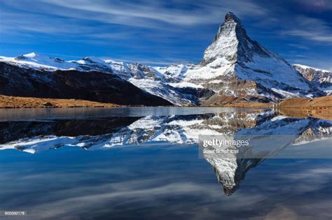 Matterhorn With Snow Reflected In The Lake Valais Switzerland High Res
