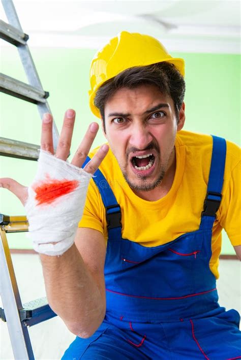 The Injured Worker At The Work Site Stock Photo Image Of Frustrated