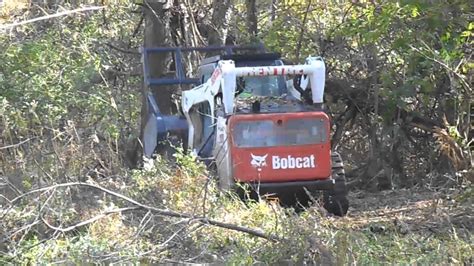 Bobcat Of St Louis Forestry Cutter Attachment Youtube
