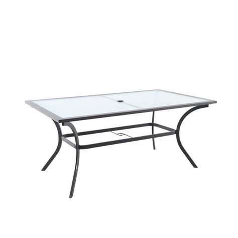Adding a patio table cover with an umbrella hole limits the amount of debris and dirt that can damage or ruin your patio table. Garden Treasures Vinehaven Rectangle Dining Table 38-in W ...