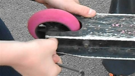 The seat contours to the back of the driver — and passenger. how to take a back wheel off of a scooter - YouTube
