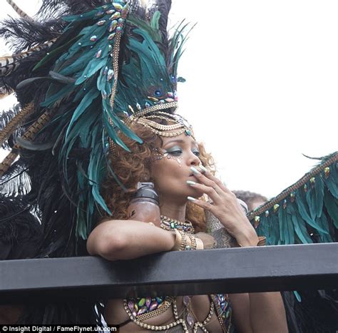 rihanna puts her figure 8 on full display in revealing costume at barbados carnival many photos