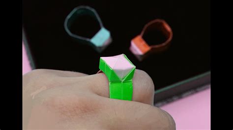 Think of these folds as creating the tip of a paper airplane. How to make a paper Ring? - YouTube