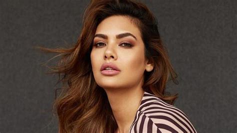 esha gupta shares sultry topless snap trolls ask film mein kaam nahi mil raha kya movies news