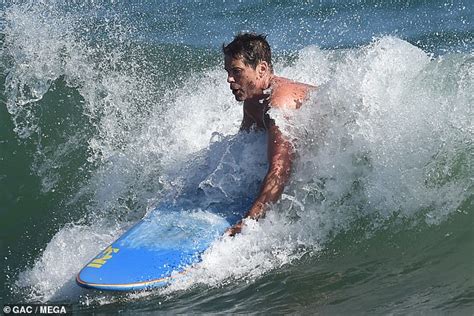 rob lowe 56 goes shirtless while surfing in santa barbara with his son matthew daily mail online