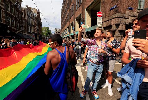 amsterdam substitutes pride walk for canal parade in 25th anniversary of gay pride