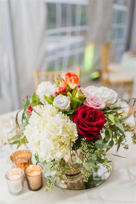 White Hydrangea And Red And Pink Rose Centerpieces