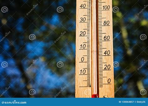 Thermometer Displaying High 30 Degree Hot Temperatures In Sun Summer