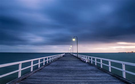 Australian Landscape Wooden Bridge Night Lights Blue Sea And Sky