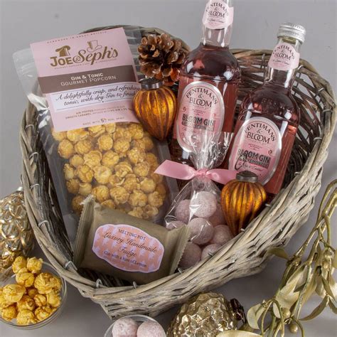 Our handcrafted baskets never fail to impress despite the low price. Pink Gin And Treats Gift Hamper | Christmas gift hampers ...