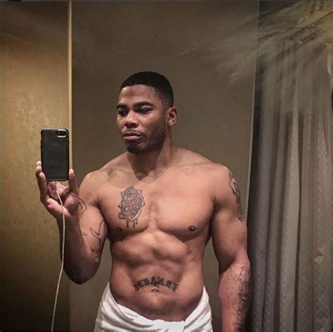 R B Rapper Nelly Shows Off Incredible Physique In Shirtless Bathroom