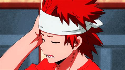 A Person With Red Hair And A White Headband On Their Head Is Looking At