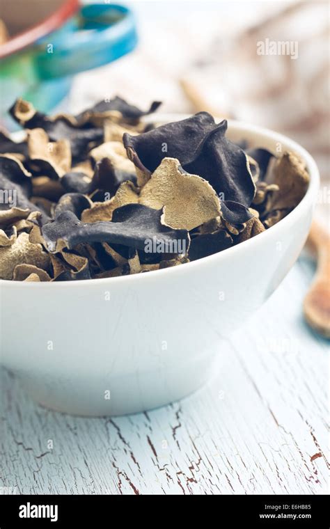 Dried Chinese Black Fungus Jelly Ear In Bowl Stock Photo Alamy
