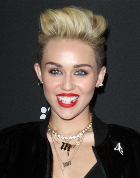 Celebrities Undressed Who Committed A Fashion Faux Pas Gold Teeth