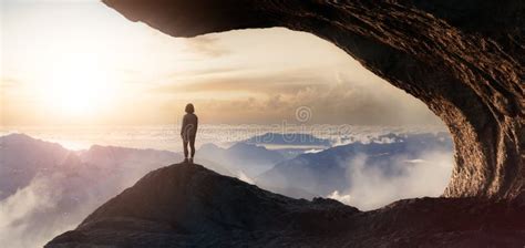 Dramatic Adventurous Scene With Woman Standing Inside A Rocky Cave