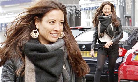 Melanie Sykes Flashes Her Legs And Taut Derrière In Black Shorts