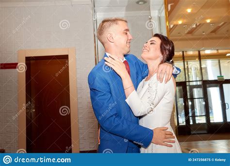 The Bride And Groom During Beautiful Marriage Ceremony At The Registry Office In Russia The
