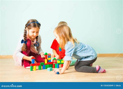 Smiling Kids Playing Building From Colorful Blocks Stock Image Image
