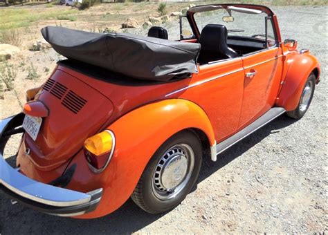 Top Down Classic Vw Beetle Convertible In Bright Orange